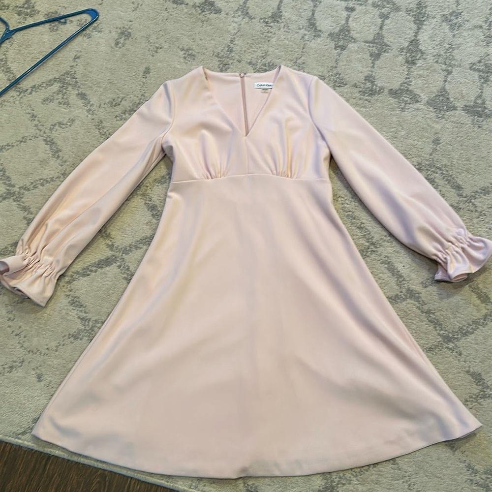 Calvin Klein long sleeve ruffle dress in pink.
